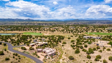 Nestled in the prestigious community of Las Campanas, 64 Calle on The Club At Las Campanas  in New Mexico - for sale on GolfHomes.com, golf home, golf lot