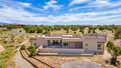 Nestled in the prestigious community of Las Campanas, 64 Calle on The Club At Las Campanas  in New Mexico - for sale on GolfHomes.com, golf home, golf lot