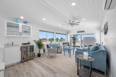 Welcome to this exceptional elvated Key West style 4-bedroom on Pasadena Yacht and Country Club in Florida - for sale on GolfHomes.com, golf home, golf lot