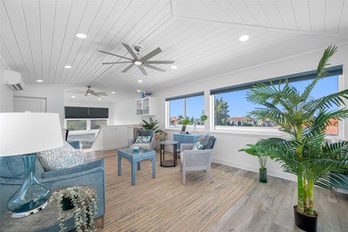 Welcome to this exceptional elvated Key West style 4-bedroom on Pasadena Yacht and Country Club in Florida - for sale on GolfHomes.com, golf home, golf lot