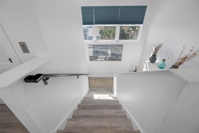 Welcome to this exceptional elvated Key West style 4-bedroom on Pasadena Yacht and Country Club in Florida - for sale on GolfHomes.com, golf home, golf lot