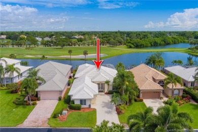 This IMMACULATE 3/3 home offers a stunning POOL & GOLF view on Santa Lucia River Club in Florida - for sale on GolfHomes.com, golf home, golf lot
