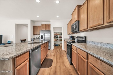 Stunning home in the 55+ community of Sun City Festival designed on Copper Canyon Golf Club in Arizona - for sale on GolfHomes.com, golf home, golf lot