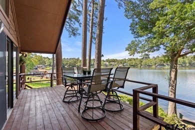 Enjoy breathtaking lake views from nearly every room in this on Hide-A-Way Lake Golf Course in Texas - for sale on GolfHomes.com, golf home, golf lot