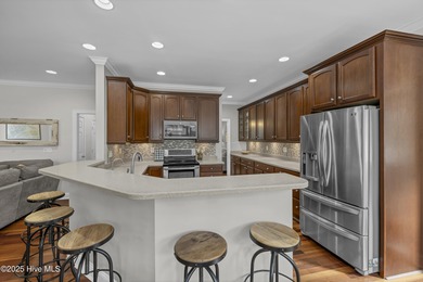 Tucked away on 1.49 private acres, this William Poole-designed on Olde Point Golf and Country Club in North Carolina - for sale on GolfHomes.com, golf home, golf lot