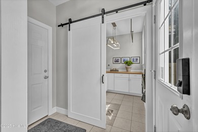 Tucked away on 1.49 private acres, this William Poole-designed on Olde Point Golf and Country Club in North Carolina - for sale on GolfHomes.com, golf home, golf lot