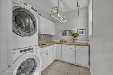 Tucked away on 1.49 private acres, this William Poole-designed on Olde Point Golf and Country Club in North Carolina - for sale on GolfHomes.com, golf home, golf lot