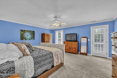 Tucked away on 1.49 private acres, this William Poole-designed on Olde Point Golf and Country Club in North Carolina - for sale on GolfHomes.com, golf home, golf lot