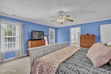 Tucked away on 1.49 private acres, this William Poole-designed on Olde Point Golf and Country Club in North Carolina - for sale on GolfHomes.com, golf home, golf lot