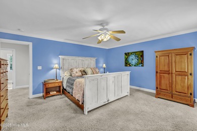 Tucked away on 1.49 private acres, this William Poole-designed on Olde Point Golf and Country Club in North Carolina - for sale on GolfHomes.com, golf home, golf lot