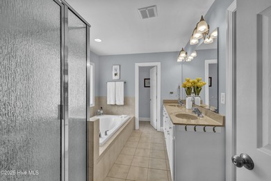 Tucked away on 1.49 private acres, this William Poole-designed on Olde Point Golf and Country Club in North Carolina - for sale on GolfHomes.com, golf home, golf lot