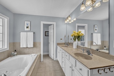 Tucked away on 1.49 private acres, this William Poole-designed on Olde Point Golf and Country Club in North Carolina - for sale on GolfHomes.com, golf home, golf lot