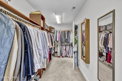 Tucked away on 1.49 private acres, this William Poole-designed on Olde Point Golf and Country Club in North Carolina - for sale on GolfHomes.com, golf home, golf lot