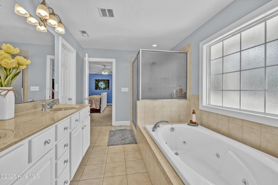 Tucked away on 1.49 private acres, this William Poole-designed on Olde Point Golf and Country Club in North Carolina - for sale on GolfHomes.com, golf home, golf lot