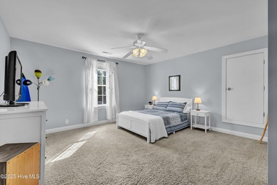 Tucked away on 1.49 private acres, this William Poole-designed on Olde Point Golf and Country Club in North Carolina - for sale on GolfHomes.com, golf home, golf lot