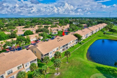 Bright, cheery 2nd floor condo with amazing water and golf on The Boca Country Club in Florida - for sale on GolfHomes.com, golf home, golf lot