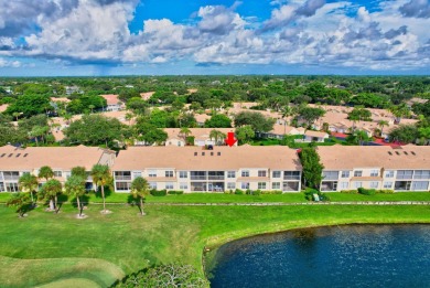 Bright, cheery 2nd floor condo with amazing water and golf on The Boca Country Club in Florida - for sale on GolfHomes.com, golf home, golf lot