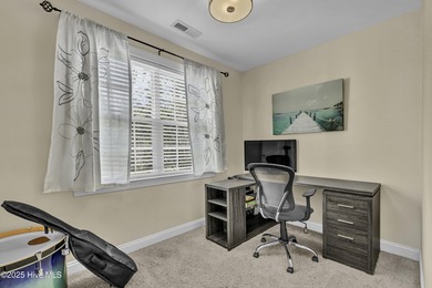 Tucked away on 1.49 private acres, this William Poole-designed on Olde Point Golf and Country Club in North Carolina - for sale on GolfHomes.com, golf home, golf lot