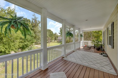 Tucked away on 1.49 private acres, this William Poole-designed on Olde Point Golf and Country Club in North Carolina - for sale on GolfHomes.com, golf home, golf lot