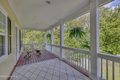 Tucked away on 1.49 private acres, this William Poole-designed on Olde Point Golf and Country Club in North Carolina - for sale on GolfHomes.com, golf home, golf lot