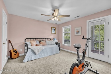 Tucked away on 1.49 private acres, this William Poole-designed on Olde Point Golf and Country Club in North Carolina - for sale on GolfHomes.com, golf home, golf lot