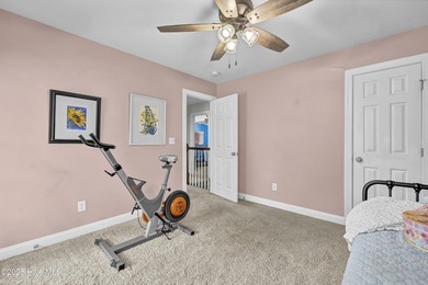 Tucked away on 1.49 private acres, this William Poole-designed on Olde Point Golf and Country Club in North Carolina - for sale on GolfHomes.com, golf home, golf lot