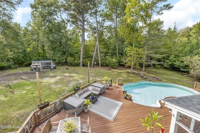 Tucked away on 1.49 private acres, this William Poole-designed on Olde Point Golf and Country Club in North Carolina - for sale on GolfHomes.com, golf home, golf lot