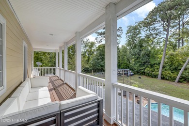 Tucked away on 1.49 private acres, this William Poole-designed on Olde Point Golf and Country Club in North Carolina - for sale on GolfHomes.com, golf home, golf lot