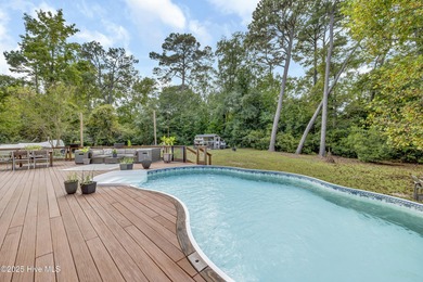 Tucked away on 1.49 private acres, this William Poole-designed on Olde Point Golf and Country Club in North Carolina - for sale on GolfHomes.com, golf home, golf lot