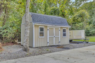 Tucked away on 1.49 private acres, this William Poole-designed on Olde Point Golf and Country Club in North Carolina - for sale on GolfHomes.com, golf home, golf lot