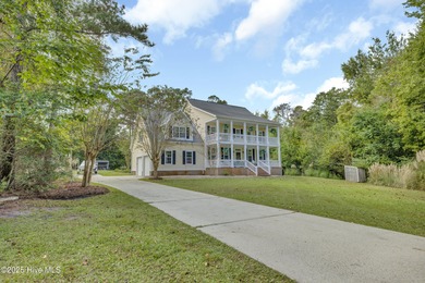 Tucked away on 1.49 private acres, this William Poole-designed on Olde Point Golf and Country Club in North Carolina - for sale on GolfHomes.com, golf home, golf lot