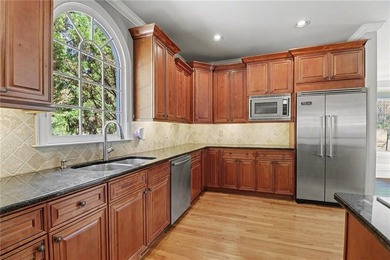 Welcome to this stunning, meticulously maintained home set along on Alpharetta Athletic Club East in Georgia - for sale on GolfHomes.com, golf home, golf lot