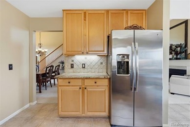 Spacious 3-bedroom, 3.5-bath, end-unit condo in the Villas at on Beacon Hill Golf Club in Michigan - for sale on GolfHomes.com, golf home, golf lot