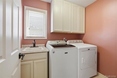 Spacious 3-bedroom, 3.5-bath, end-unit condo in the Villas at on Beacon Hill Golf Club in Michigan - for sale on GolfHomes.com, golf home, golf lot