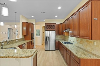 This spacious Lowcountry home in Riverton Pointe offers an open on Hampton Pointe Golf Course in South Carolina - for sale on GolfHomes.com, golf home, golf lot