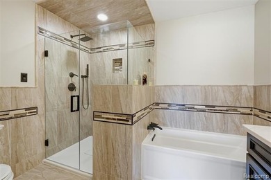 Spacious 3-bedroom, 3.5-bath, end-unit condo in the Villas at on Beacon Hill Golf Club in Michigan - for sale on GolfHomes.com, golf home, golf lot