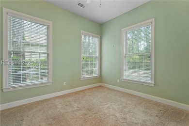 This spacious Lowcountry home in Riverton Pointe offers an open on Hampton Pointe Golf Course in South Carolina - for sale on GolfHomes.com, golf home, golf lot