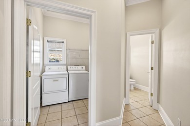 Welcome to 6516 Koula Drive, a peaceful retreat tucked away in on Diamondhead Country Club in Mississippi - for sale on GolfHomes.com, golf home, golf lot