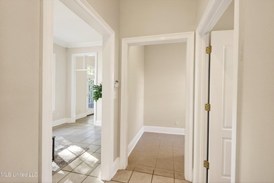 Welcome to 6516 Koula Drive, a peaceful retreat tucked away in on Diamondhead Country Club in Mississippi - for sale on GolfHomes.com, golf home, golf lot