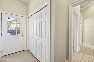 Welcome to 6516 Koula Drive, a peaceful retreat tucked away in on Diamondhead Country Club in Mississippi - for sale on GolfHomes.com, golf home, golf lot