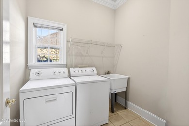 Welcome to 6516 Koula Drive, a peaceful retreat tucked away in on Diamondhead Country Club in Mississippi - for sale on GolfHomes.com, golf home, golf lot