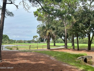 Welcome to your dream home in the highly sought-after golf on The Golf Club At Cypress Head in Florida - for sale on GolfHomes.com, golf home, golf lot