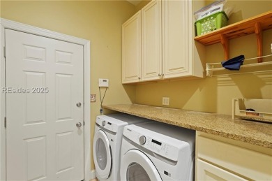 This spacious Lowcountry home in Riverton Pointe offers an open on Hampton Pointe Golf Course in South Carolina - for sale on GolfHomes.com, golf home, golf lot