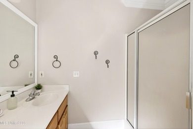 Welcome to 6516 Koula Drive, a peaceful retreat tucked away in on Diamondhead Country Club in Mississippi - for sale on GolfHomes.com, golf home, golf lot