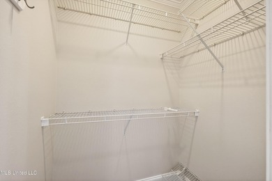 Welcome to 6516 Koula Drive, a peaceful retreat tucked away in on Diamondhead Country Club in Mississippi - for sale on GolfHomes.com, golf home, golf lot