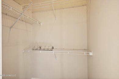 Welcome to 6516 Koula Drive, a peaceful retreat tucked away in on Diamondhead Country Club in Mississippi - for sale on GolfHomes.com, golf home, golf lot