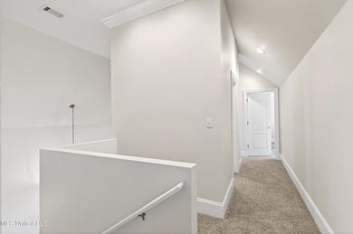 Welcome to 6516 Koula Drive, a peaceful retreat tucked away in on Diamondhead Country Club in Mississippi - for sale on GolfHomes.com, golf home, golf lot