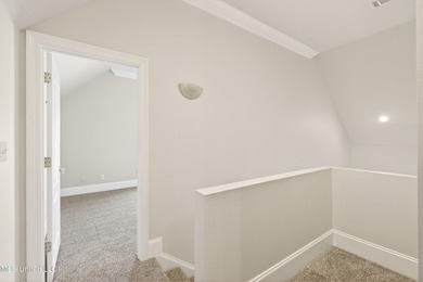 Welcome to 6516 Koula Drive, a peaceful retreat tucked away in on Diamondhead Country Club in Mississippi - for sale on GolfHomes.com, golf home, golf lot