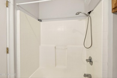 Welcome to 6516 Koula Drive, a peaceful retreat tucked away in on Diamondhead Country Club in Mississippi - for sale on GolfHomes.com, golf home, golf lot