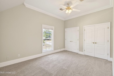 Welcome to 6516 Koula Drive, a peaceful retreat tucked away in on Diamondhead Country Club in Mississippi - for sale on GolfHomes.com, golf home, golf lot